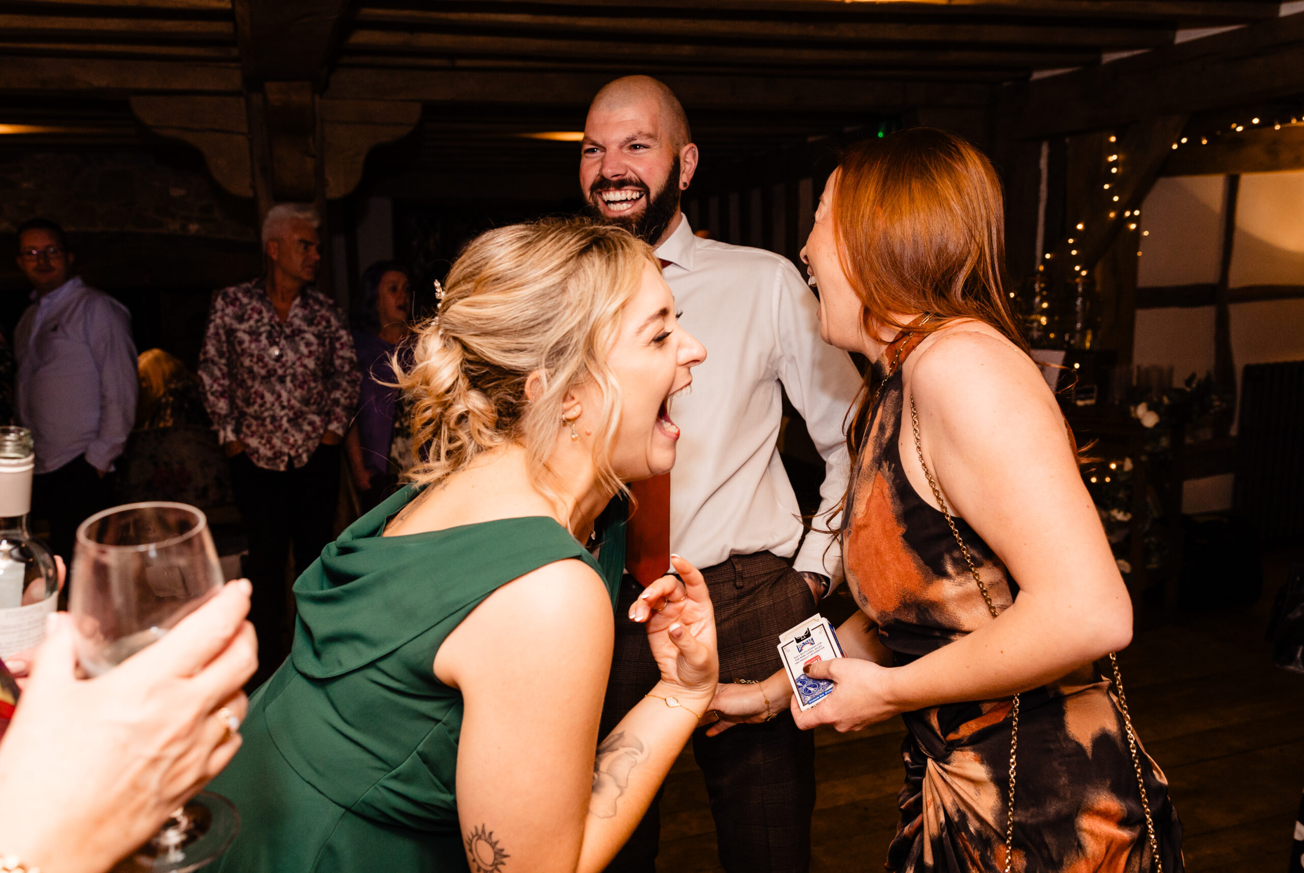 David Hitchcott entertaining guests with close-up magic at Cain Manor